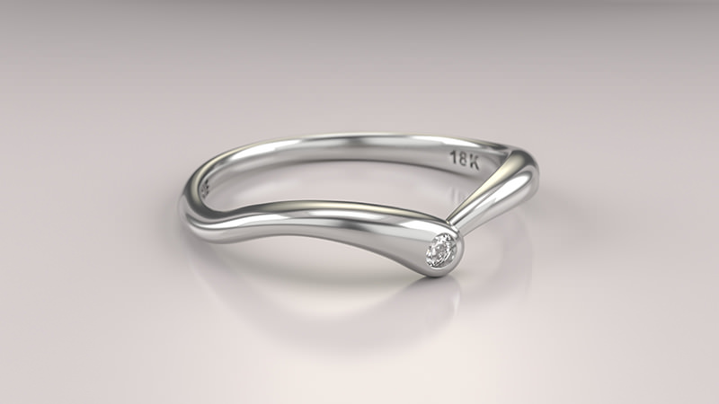 Detalhe da Aliança Curves em ouro branco usada como aparador